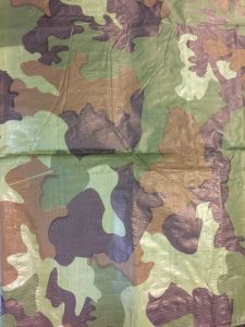 Portion of camouflage tarp